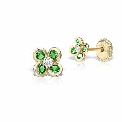 a pair of baby earrings with green stones