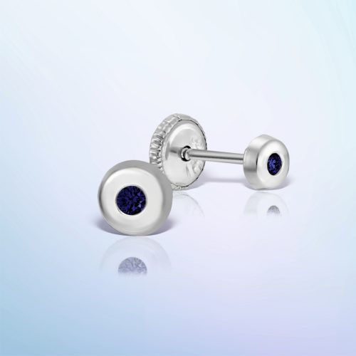 a pair of white gold earrings with blue stones