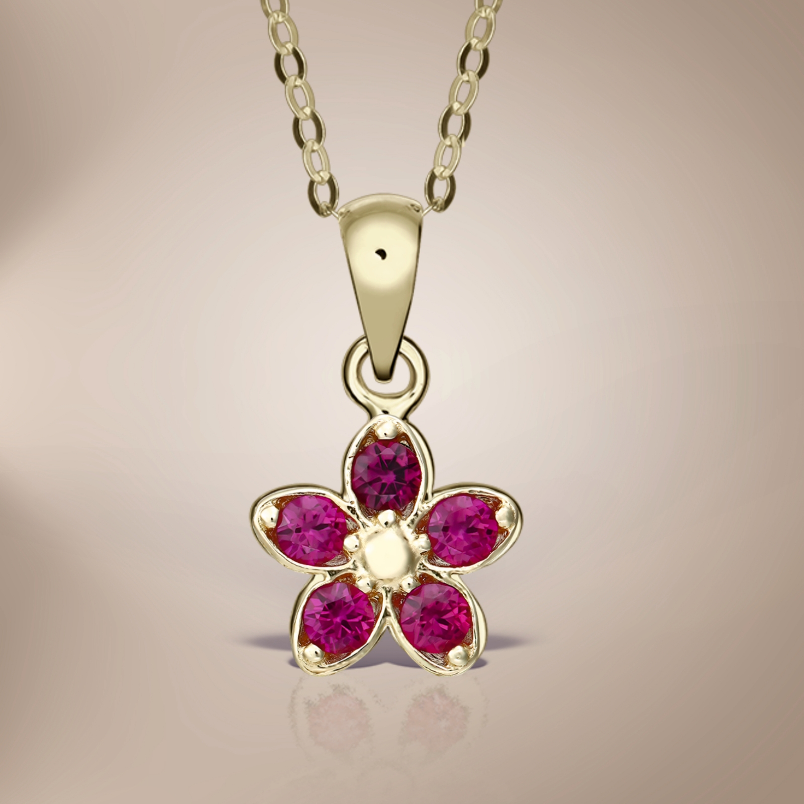 Lănțișor din aur și pandantiv cu pietricele rubinii - imagine 2